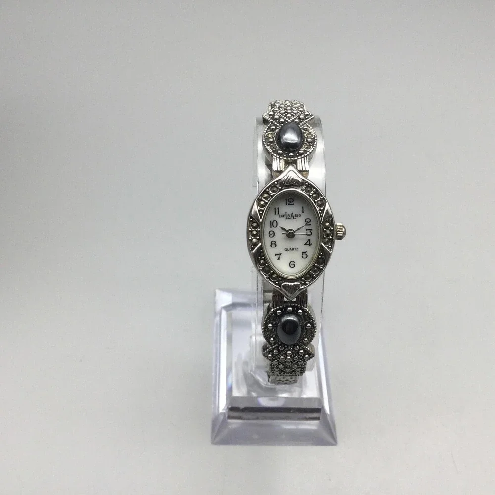 LA Express Womens Watch 18mm MOP Dial Silver Tone Marcasite Stretch New Battery